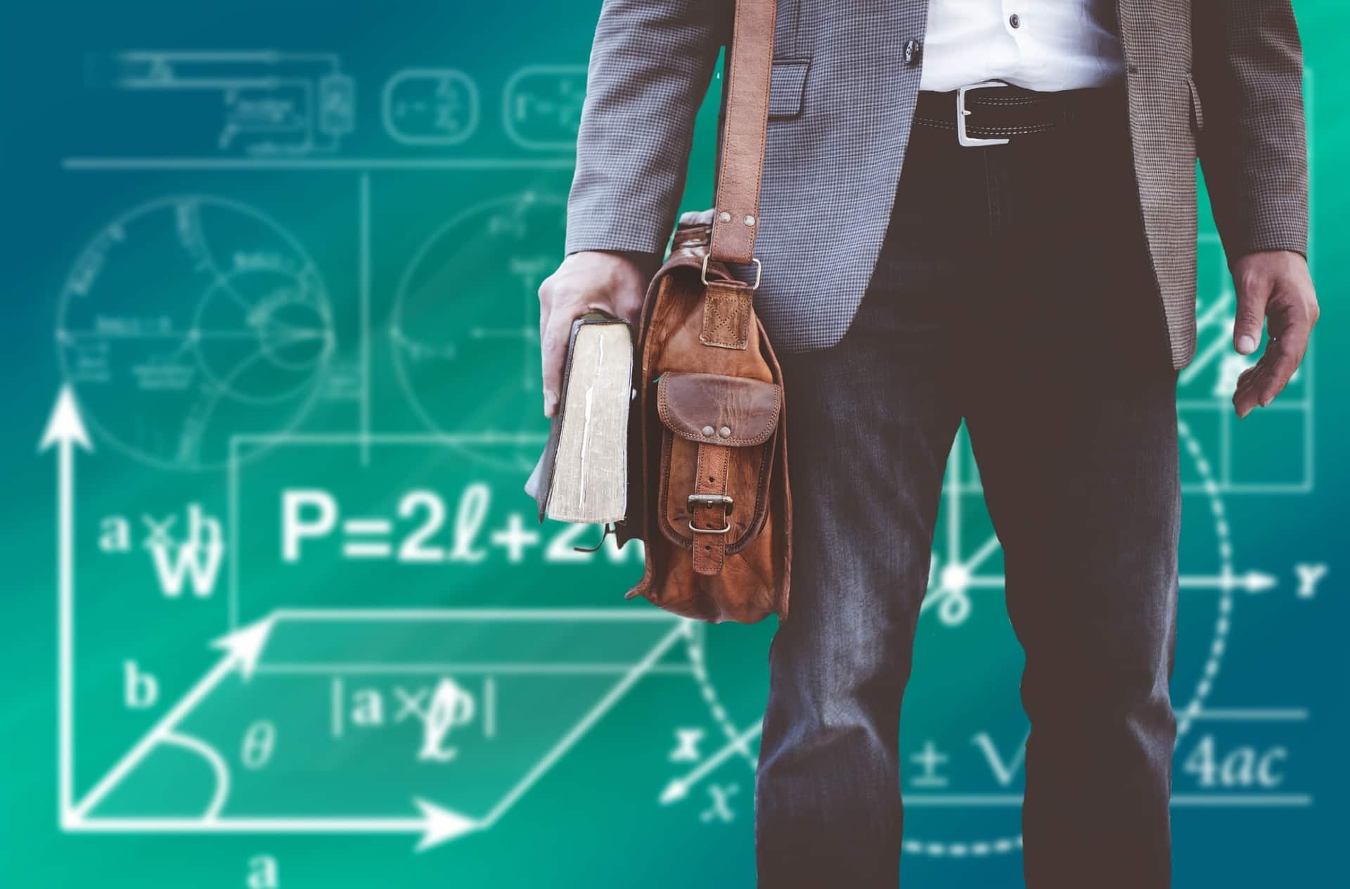 Teacher's laptop bag with chalkboard in the background